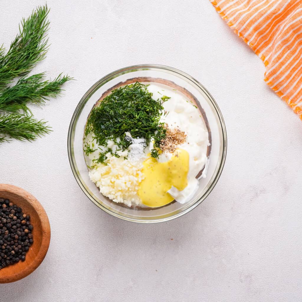 dill sauce ingredients in glass bowl