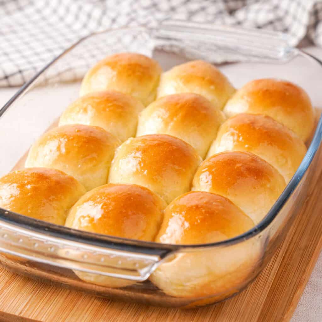 buttery dinner rolls in glass dish
