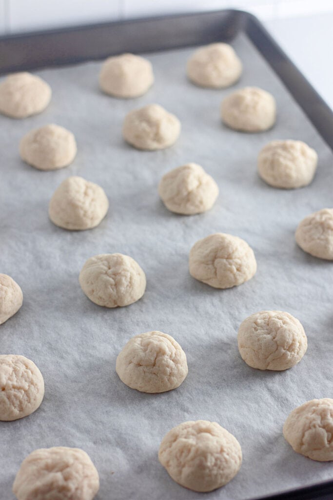 cream cheese cookies on baking sheet