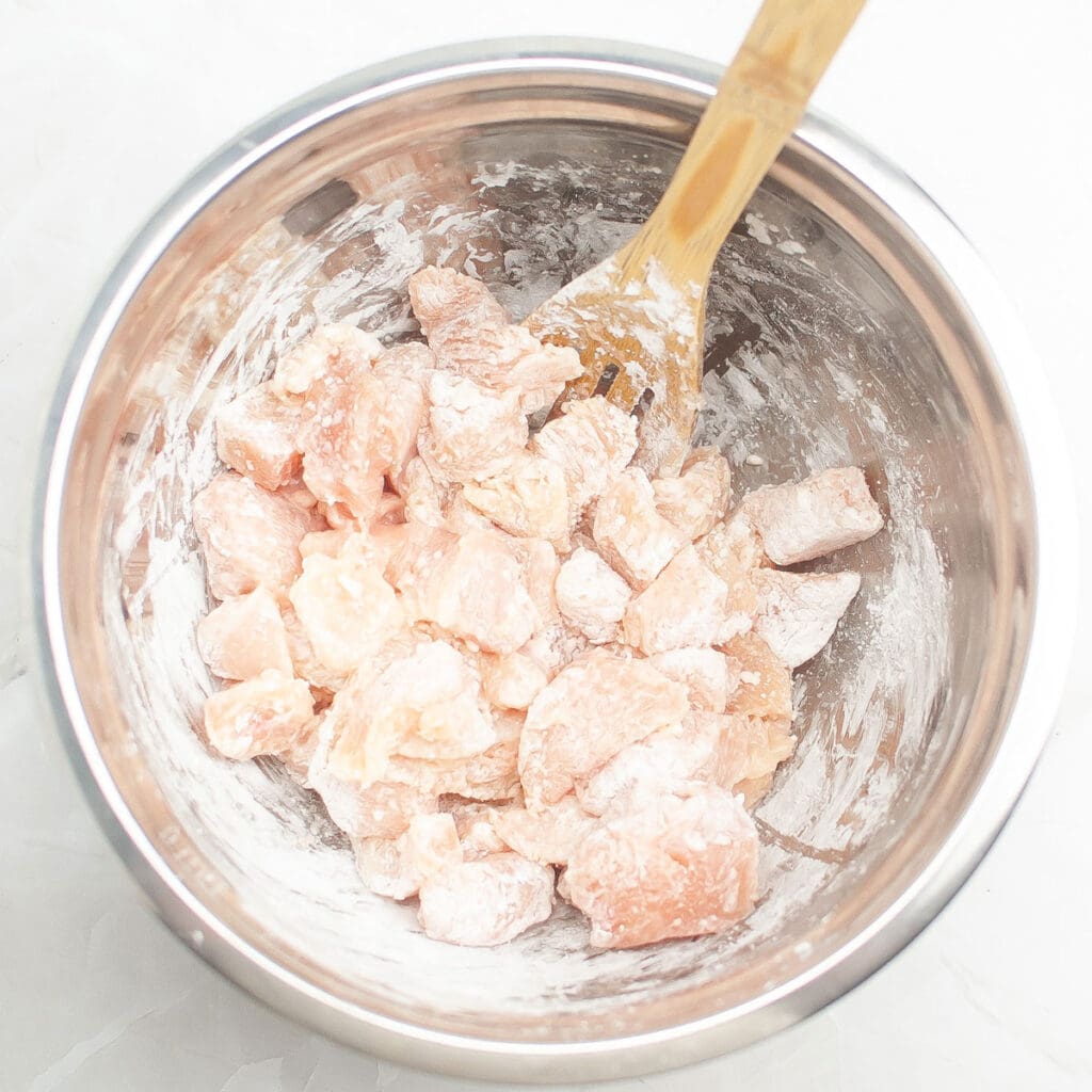 cubed chicken coated with cornstarch