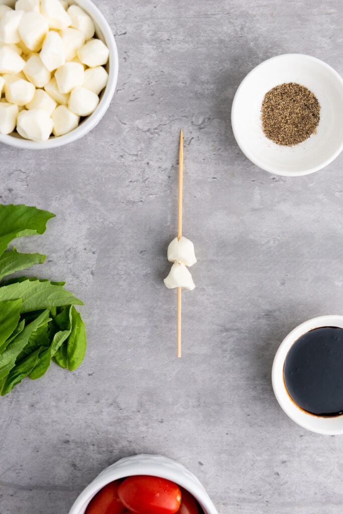 small mozzarella balls on skewer