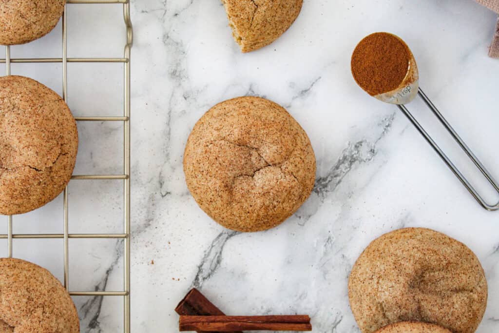 chewy snickerdoodles on marble counter