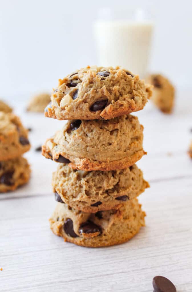 four chunky monkey cookies stacked on top of each other