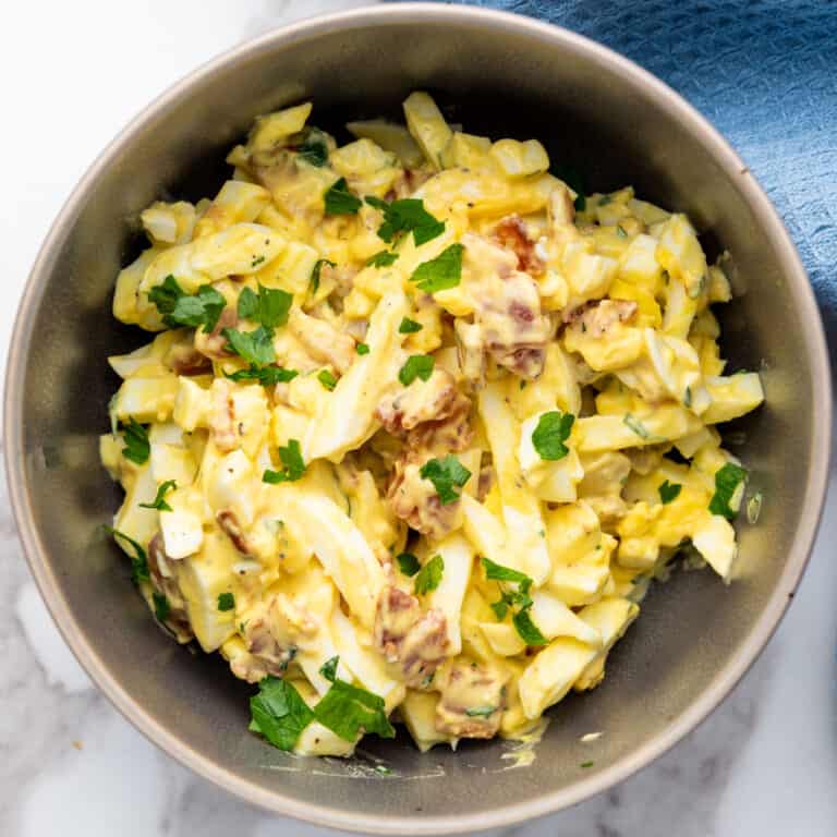 egg salad with bacon in metal bowl