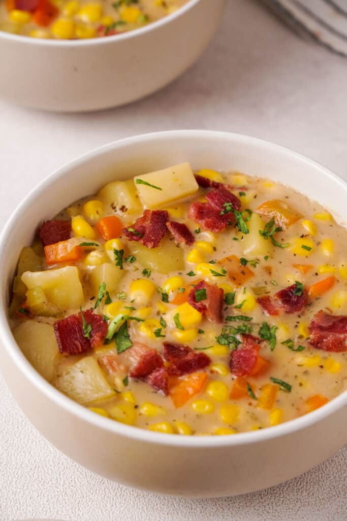 corn chowder in white bowl