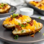 twice baked potatoes on gray plate