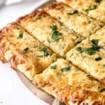 cheesy garlic breadsticks close up