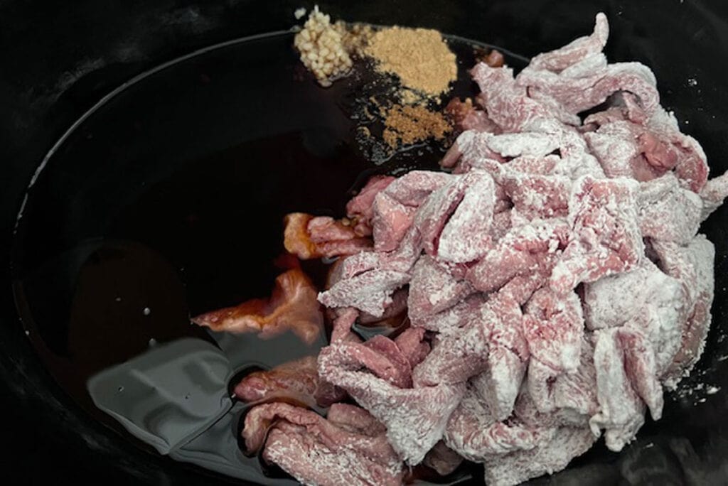 Mongolian beef ingredients in slow cooker before cooking