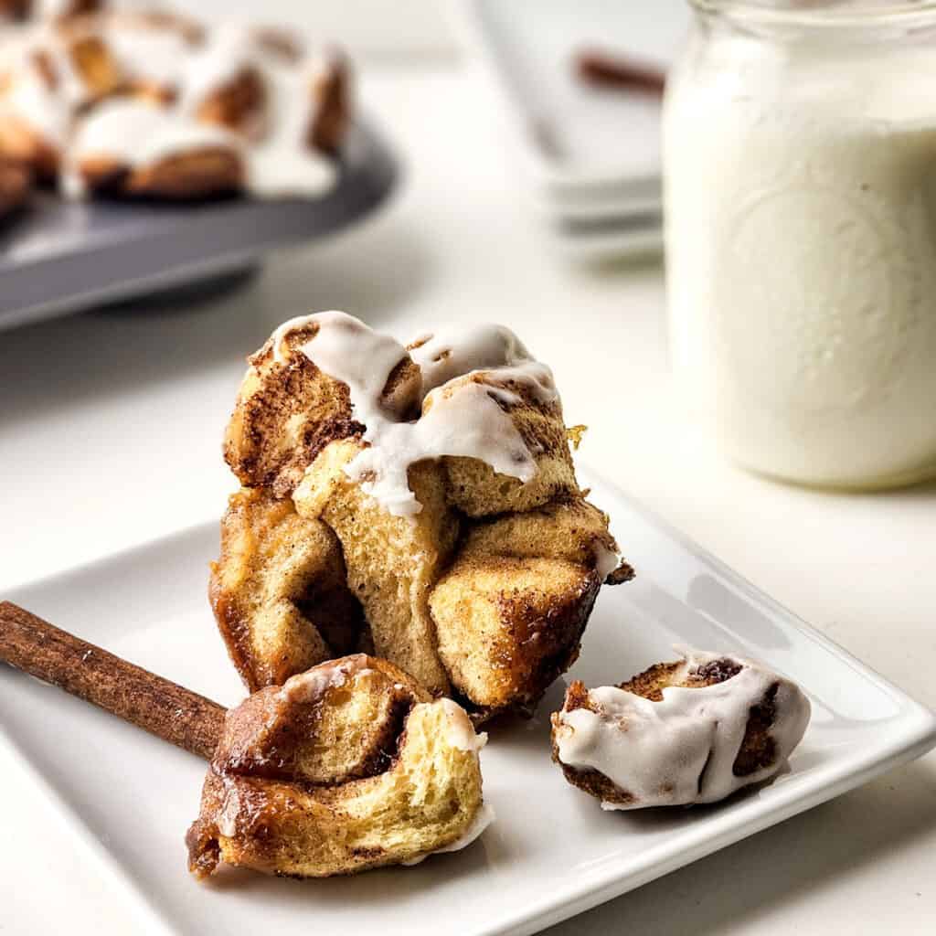 monkey bread muffin on plate with fork holding a piece