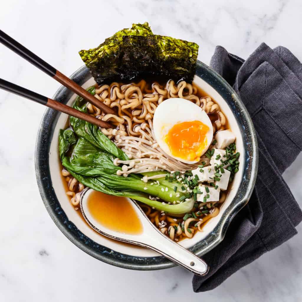 bowl of ramen topped with soft boiled egg