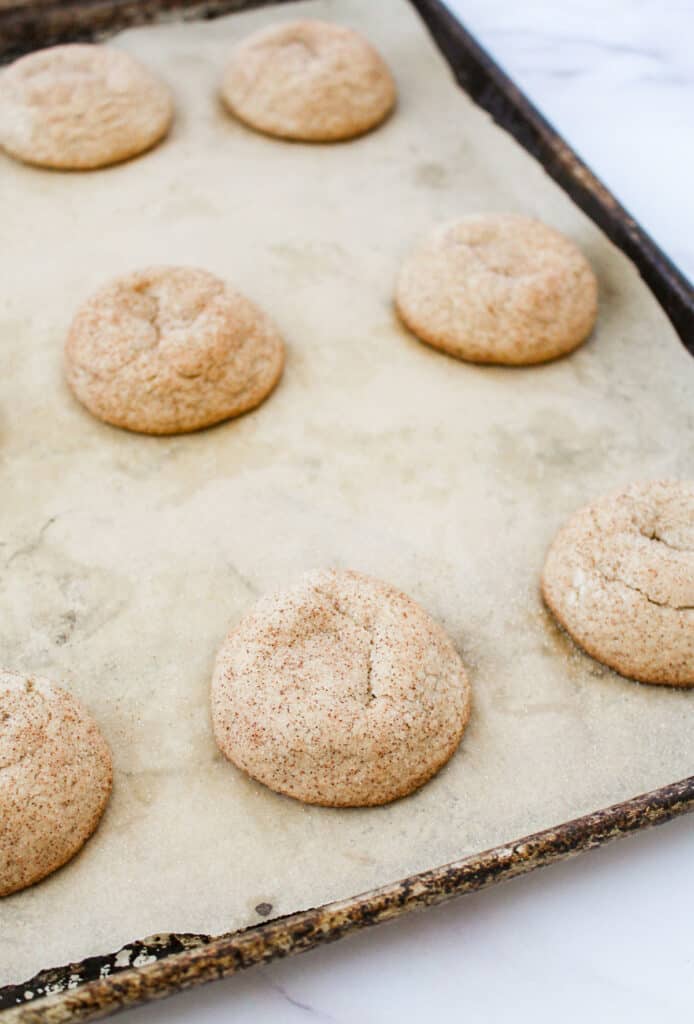 chewy snickerdoodles on baking sheet