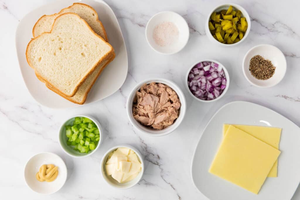 tuna melt ingredients in bowls on counter