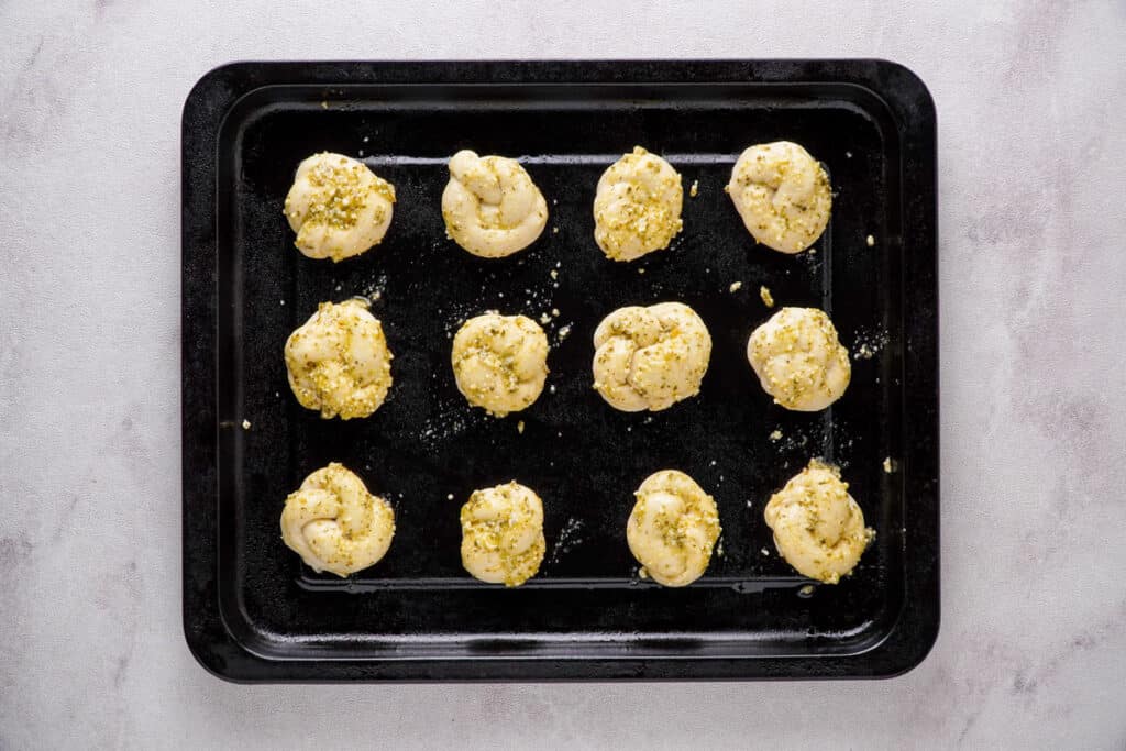 garlic knots on baking sheet before baking