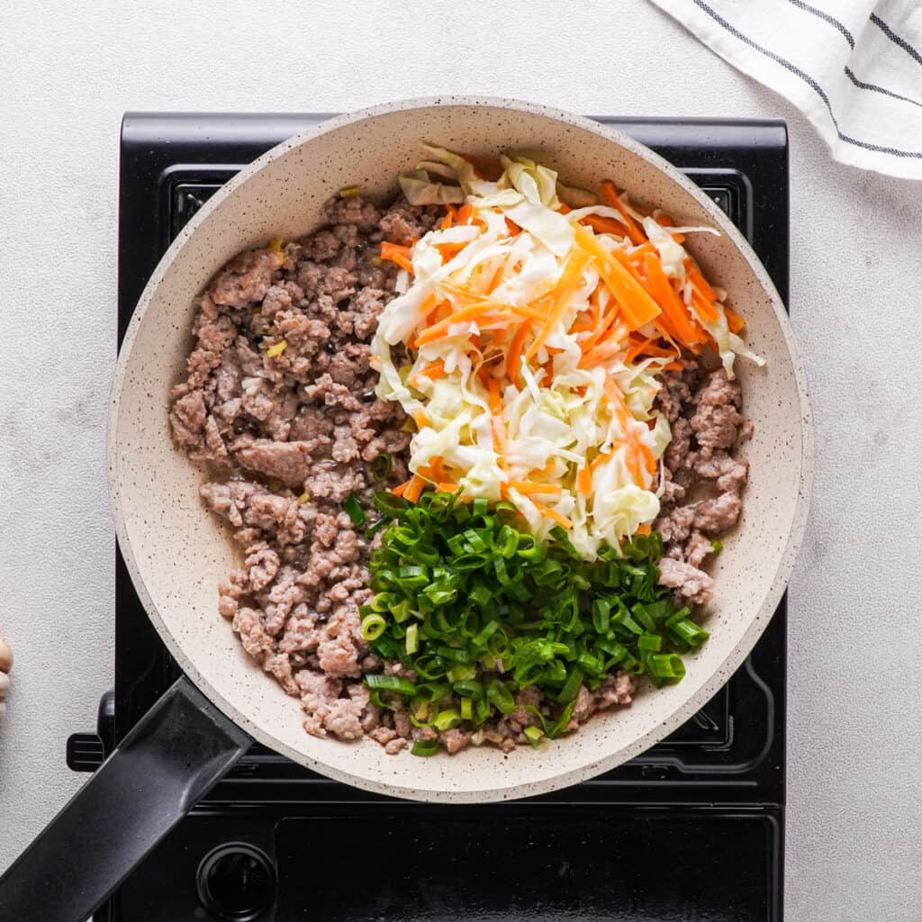 egg roll filling ingredients in skillet