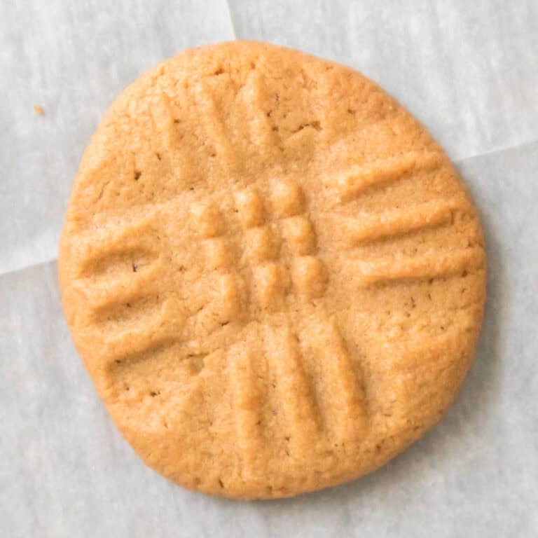 3 ingredient peanut butter cookie on parchment paper