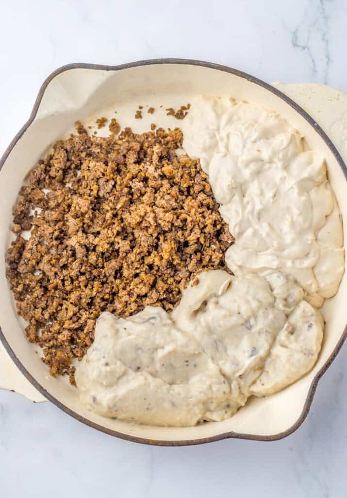 beef, cream of mushroom soup, and sour cream in pot