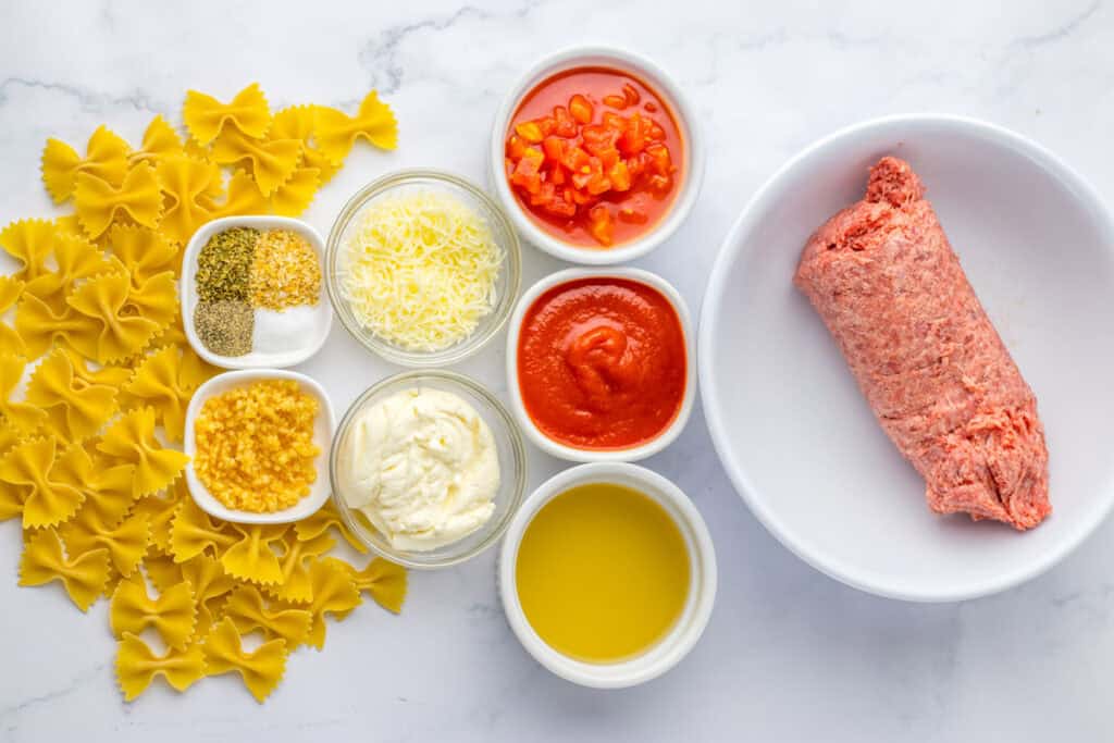 skillet lasagna ingredients on countertop in bowls