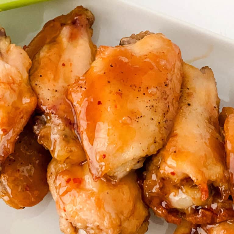 sweet chili wings on white plate