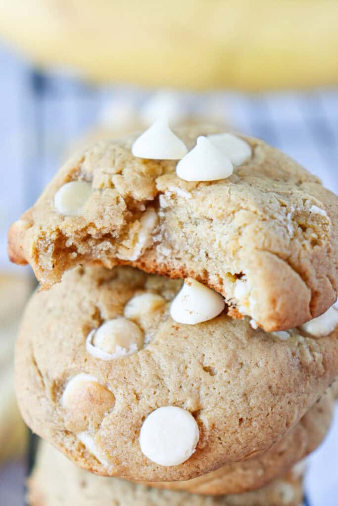 banana pudding cookies stack with one bitten into