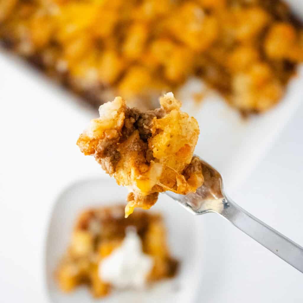 bite of taco tot casserole on fork