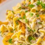 collage of french onion beef casserole with recipe name overlay