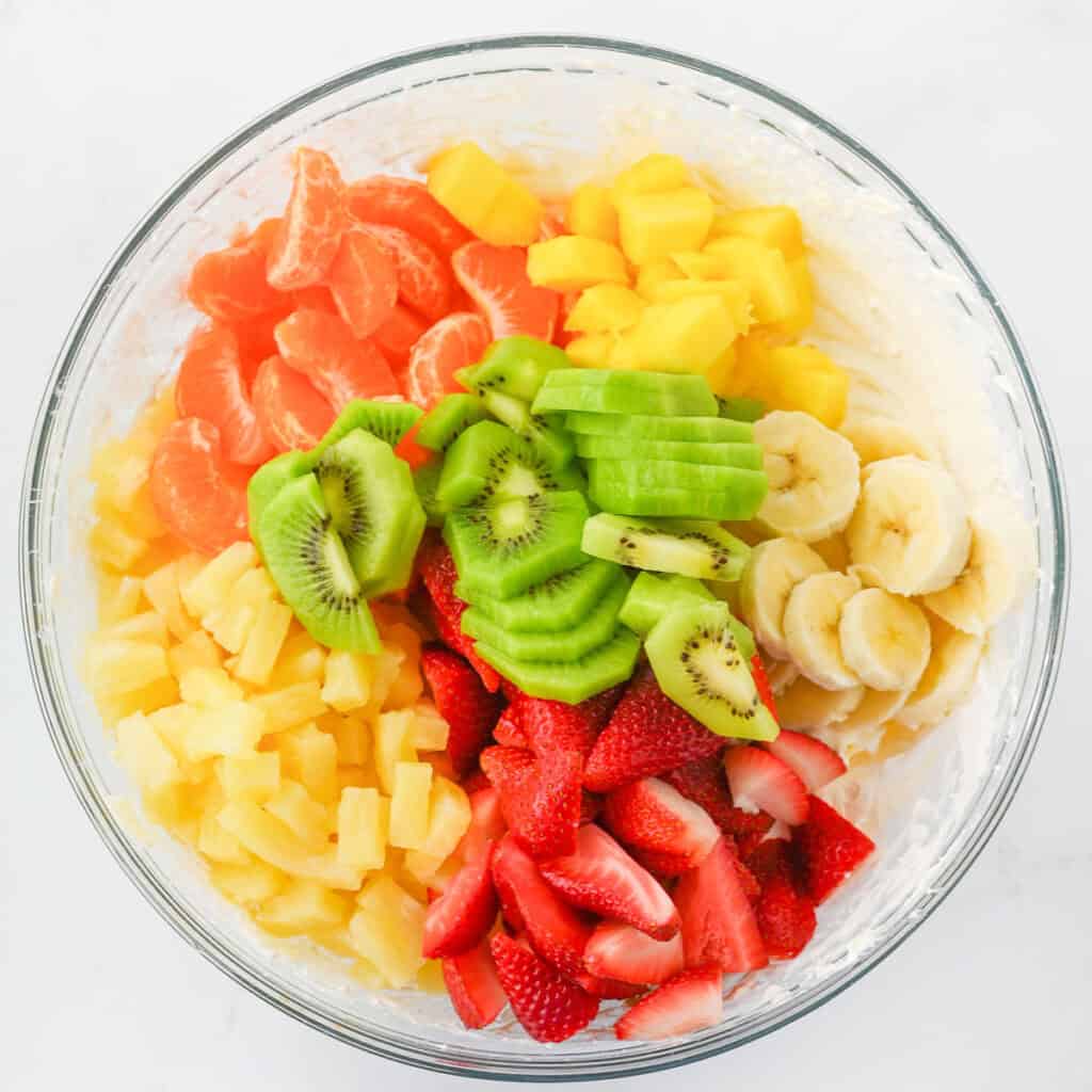 chopped fruit in glass bowl