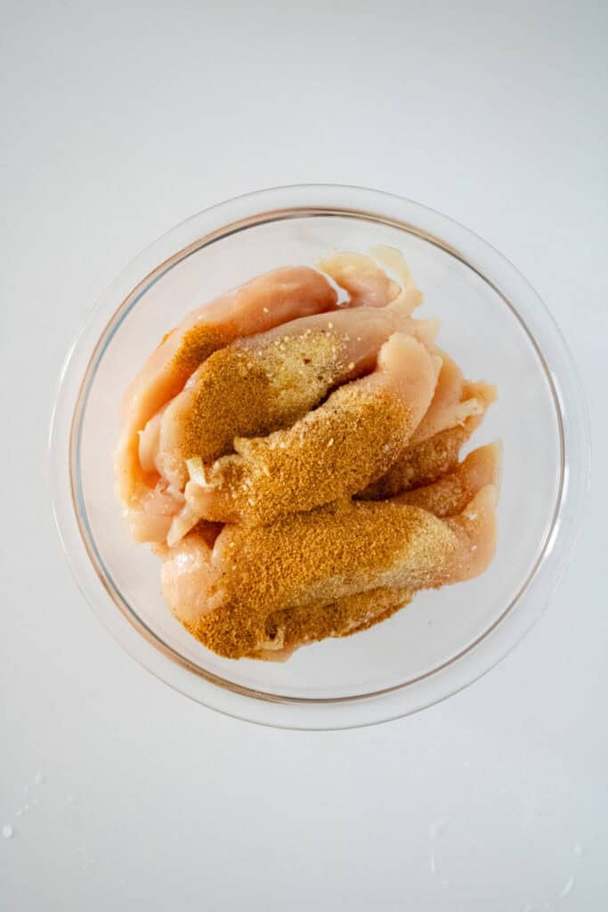 raw chicken with seasoning