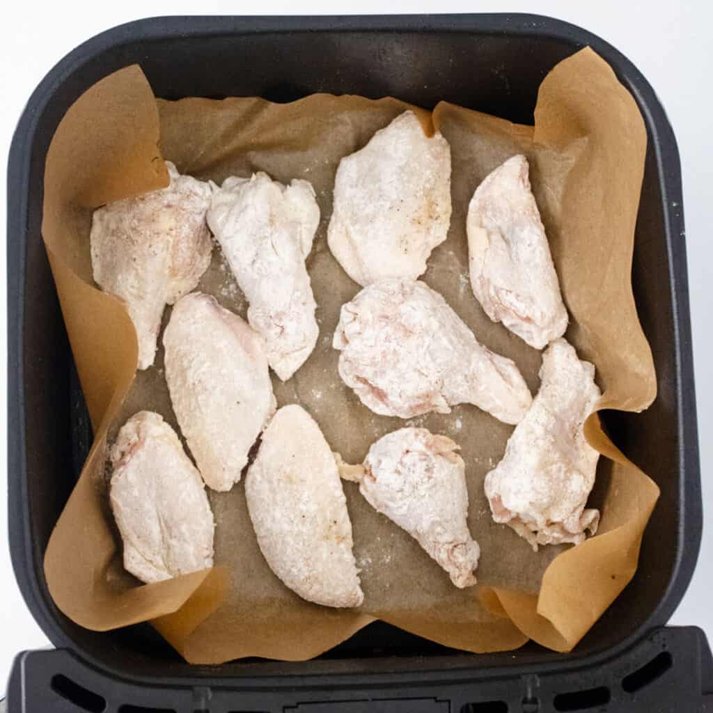 sweet chili wings in air fryer before cooking