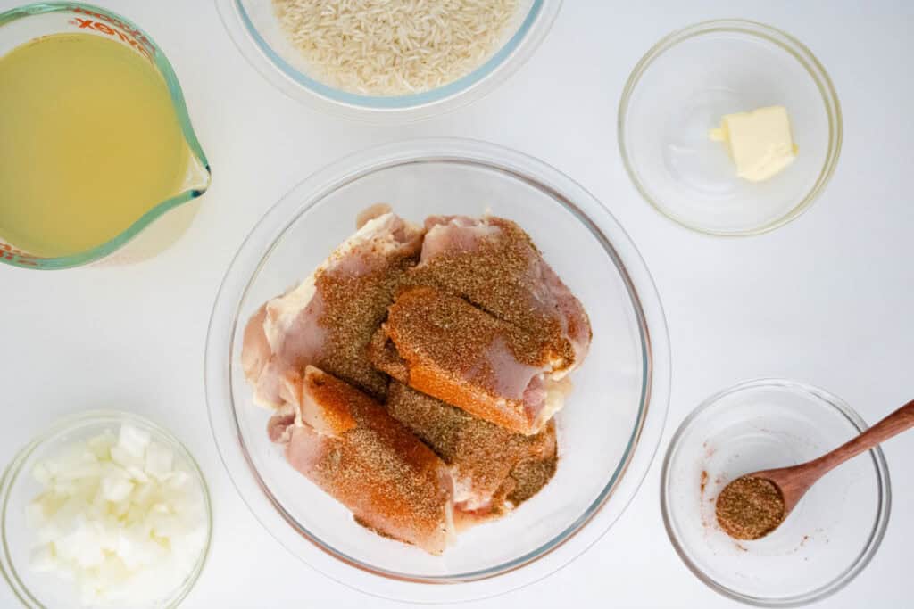 One Pot Chicken and Rice ingredients in bowls on counter