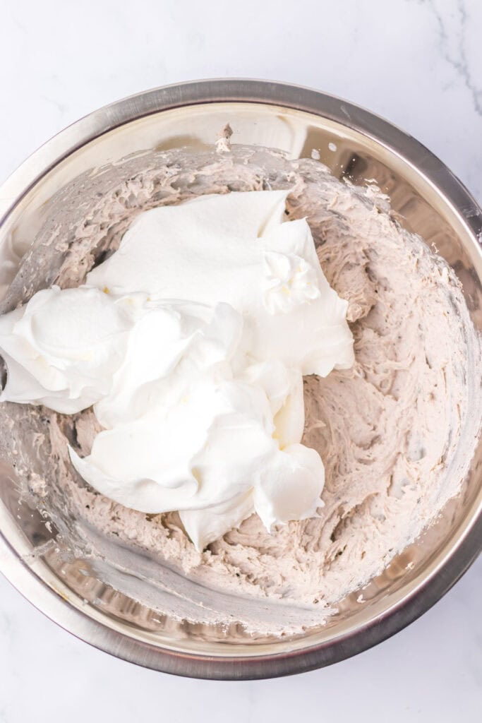 whipped cream in bowl with oreo fluff