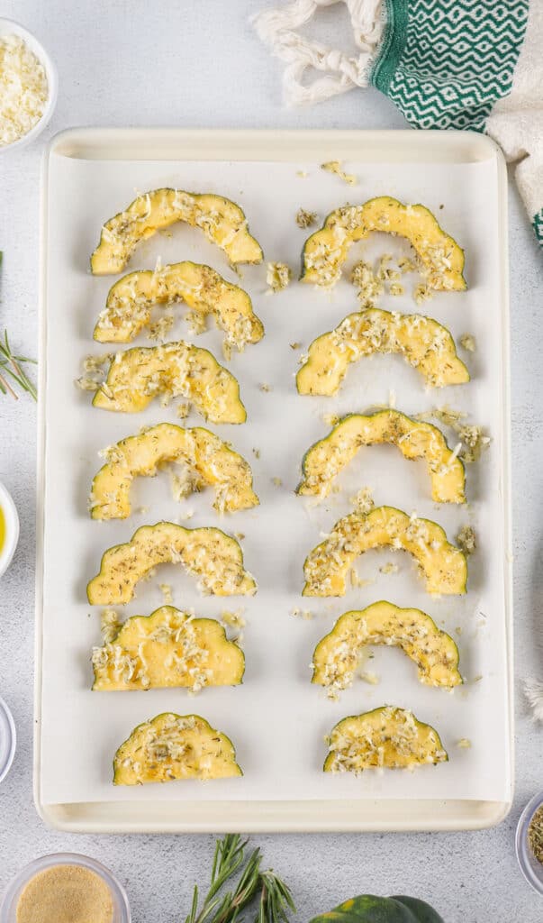 acorn squash on tray before baking