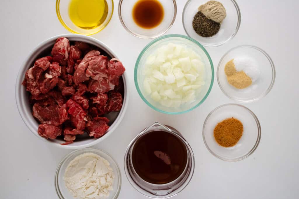 Dutch oven beef tips ingredients in glass bowls