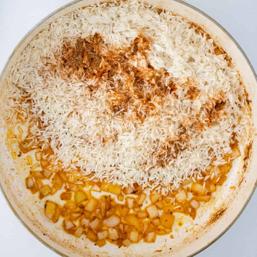 cooking rice in skillet