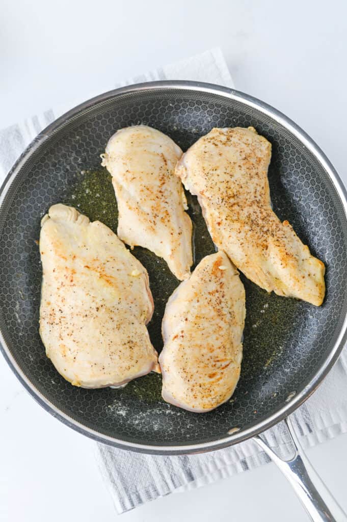 chicken breasts in skillet