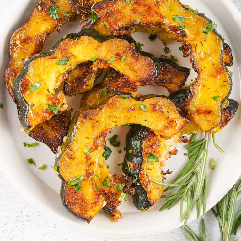 roasted acorn squash slices on plate