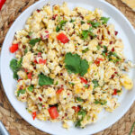 white plate with fiesta scrambled eggs