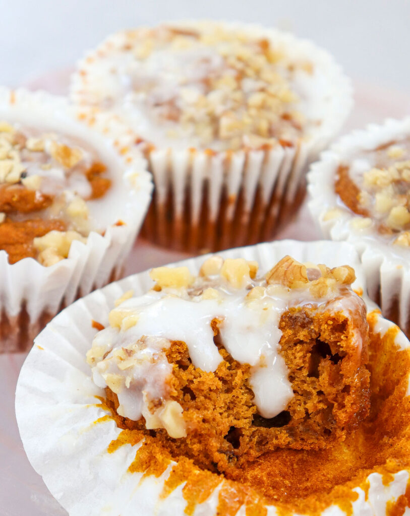 pumpkin muffins with one bitten