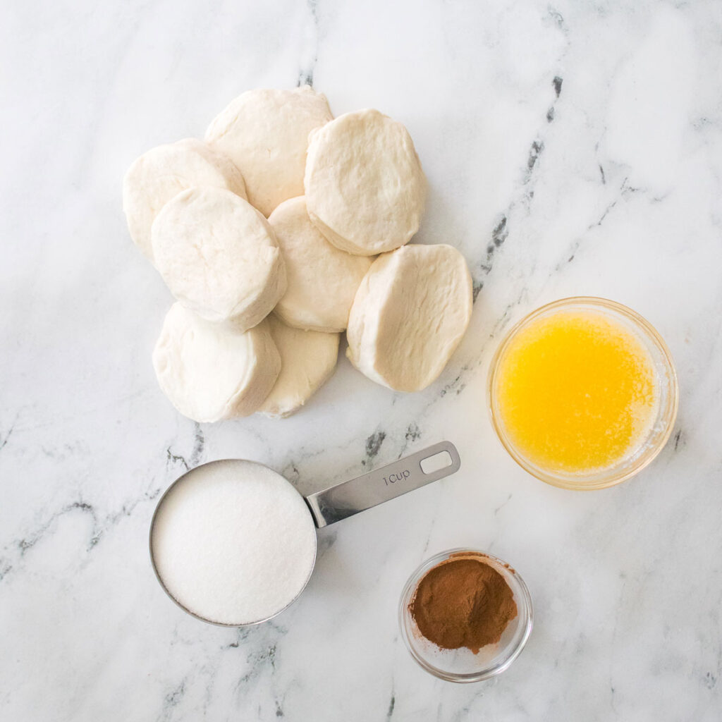 Cinnamon Sugar Biscuit Bites ingredients on countertop