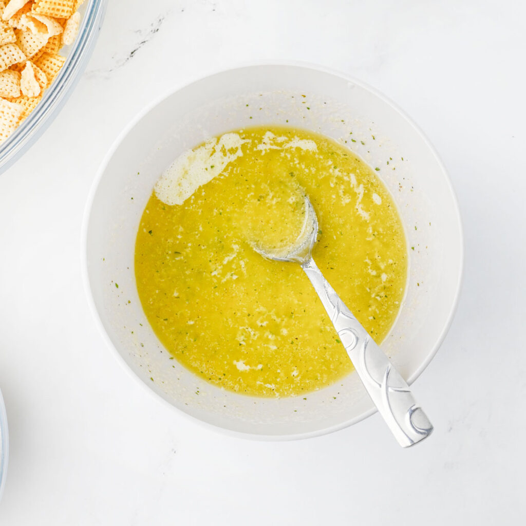 melted butter with seasonings in bowl