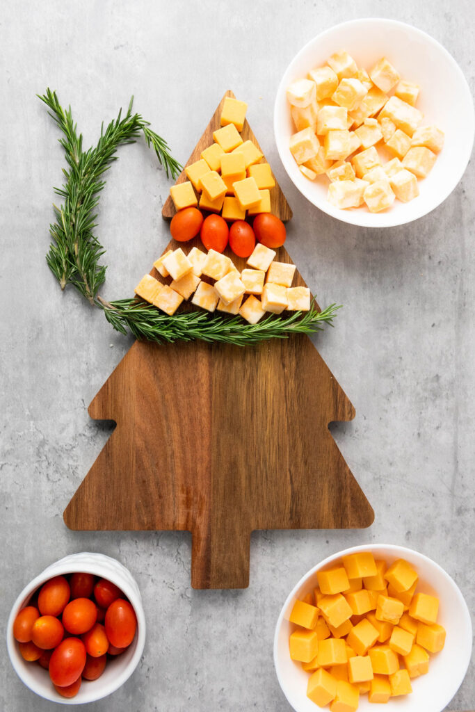 partially assembled Christmas tree cheese platter