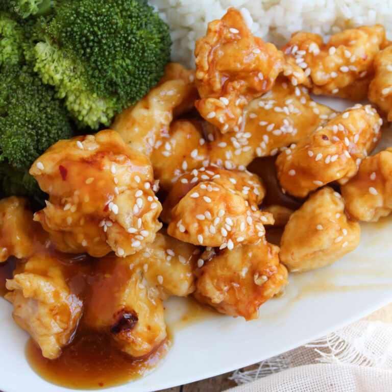 orange chicken with rice and broccoli