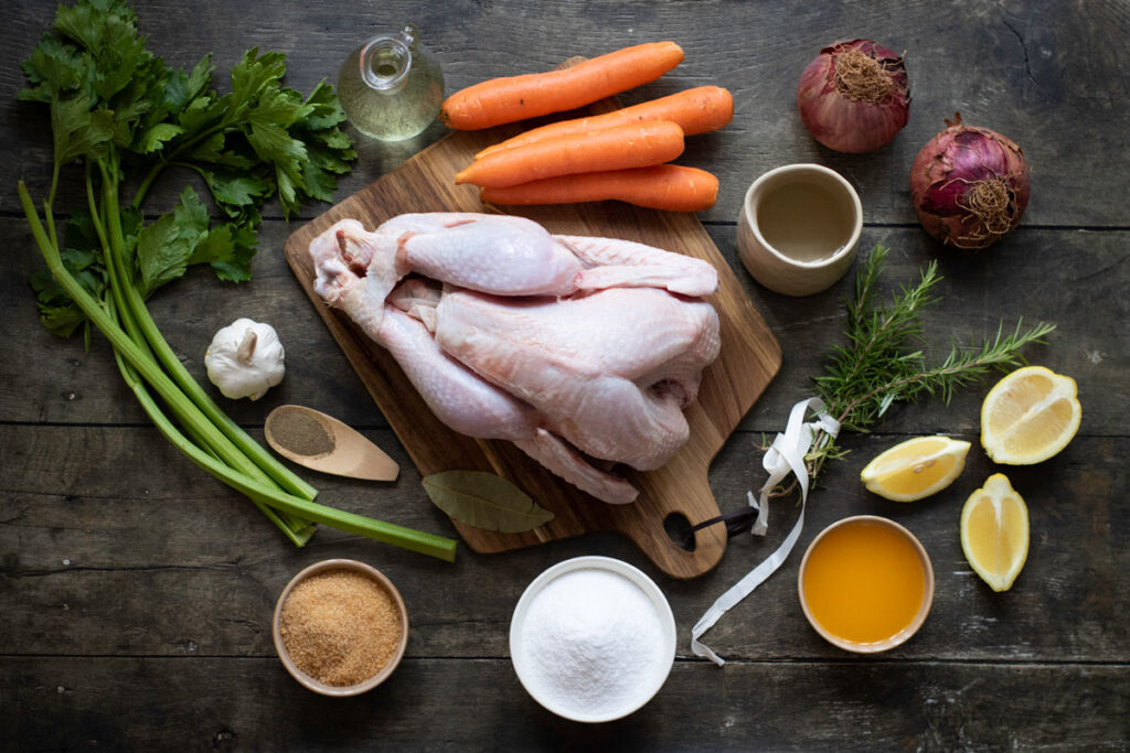 roast turkey ingredients laid out on dark countertop