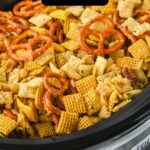 slow cooker chex mix in crockpot with recipe name overlay