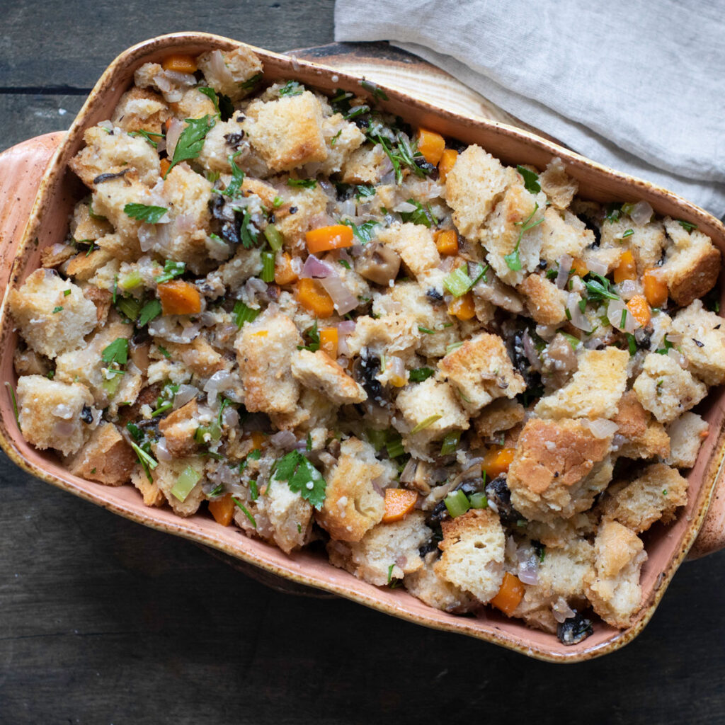 vegetable herb stuffing in casserole dish before baking