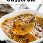 scooping sweet potato casserole out of baking dish with recipe name overlay