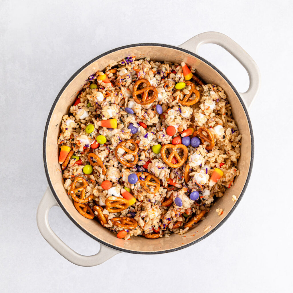 Halloween rice krispie treats mixing in pot