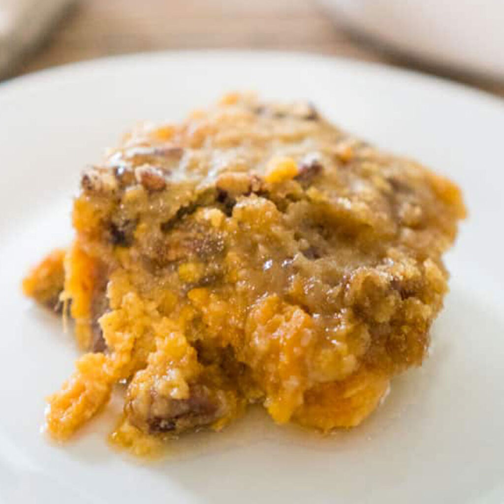serving of sweet potato casserole on white plate
