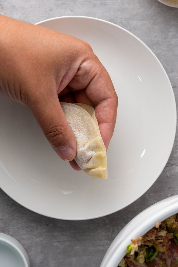 folding dumplings