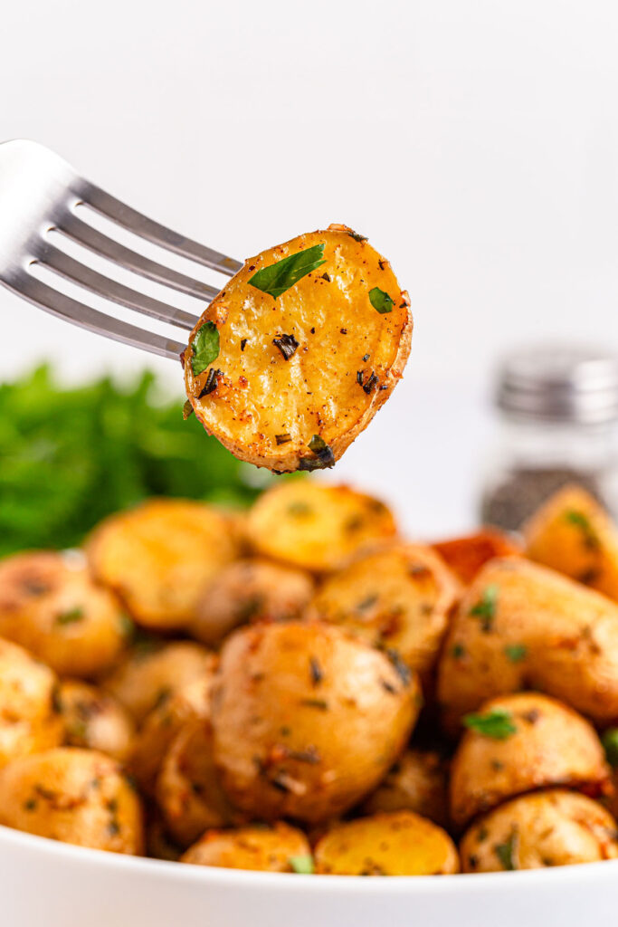 fork with crispy roasted potato