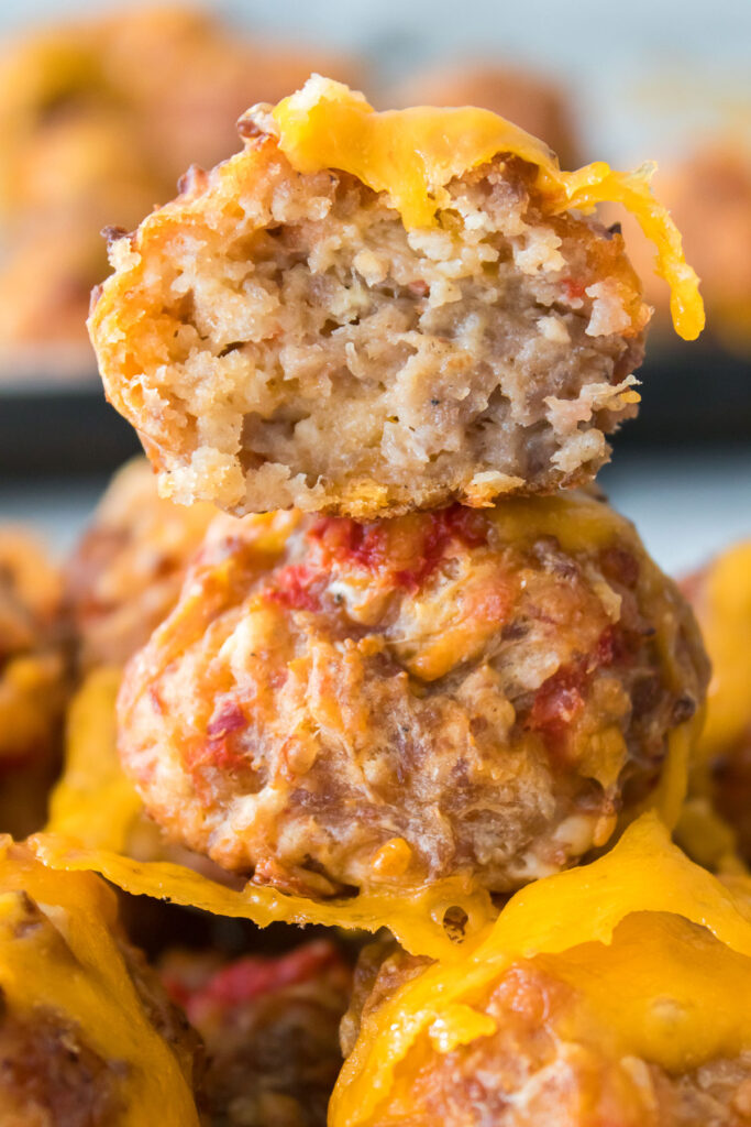 stacked rotel sausage balls with one cut in half